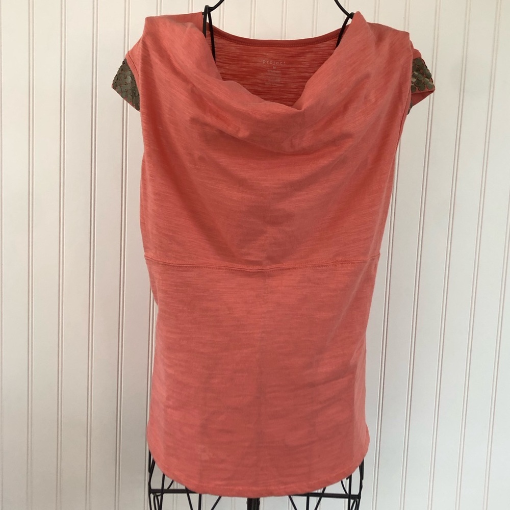 Peach shirt with sleeve detailing from the brand Project